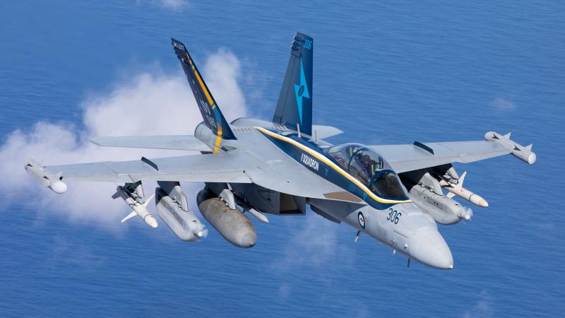 Royal Australian Air Force EA-18G Growler A46-306 conducts air-to-air formation flying off the coast of South East Queensland.