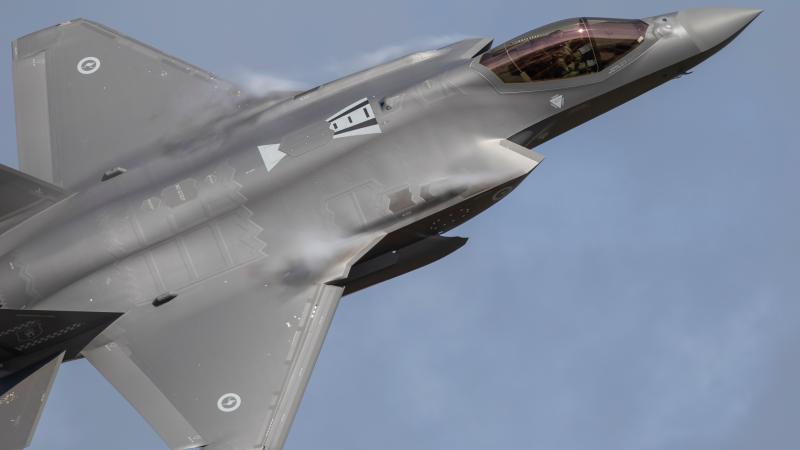 A Royal Australian Air Force F-35A Lightning II aircraft performs a flying display during the No. 75 Squadron family day at RAAF Base Tindal, near Katherine in the Northern Territory.