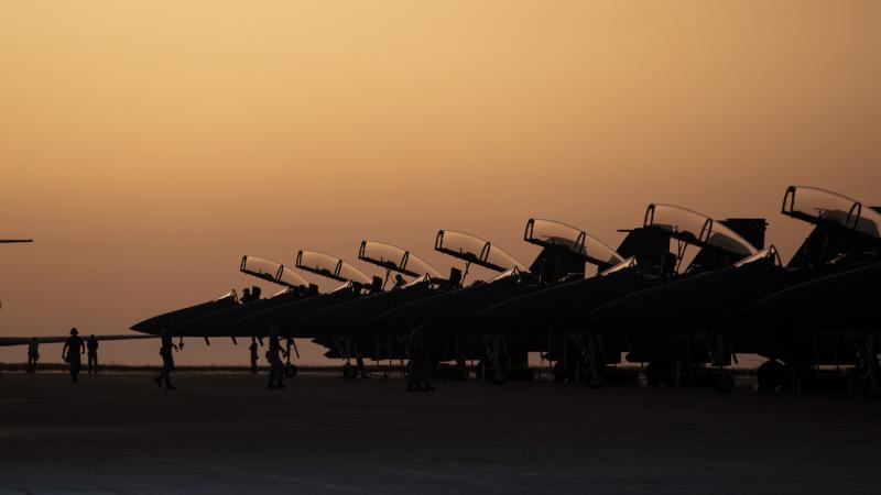 Republic of Singapore Air Force personnel prepare F-15SG Eagle aircraft for night operations during Exercise Pitch Black 2022, at RAAF Base Darwin.